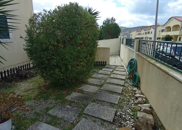 - Ou - Estacionamento A Porta