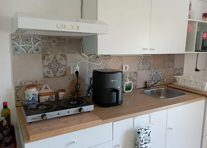 - Ou - Estacionamento A Porta